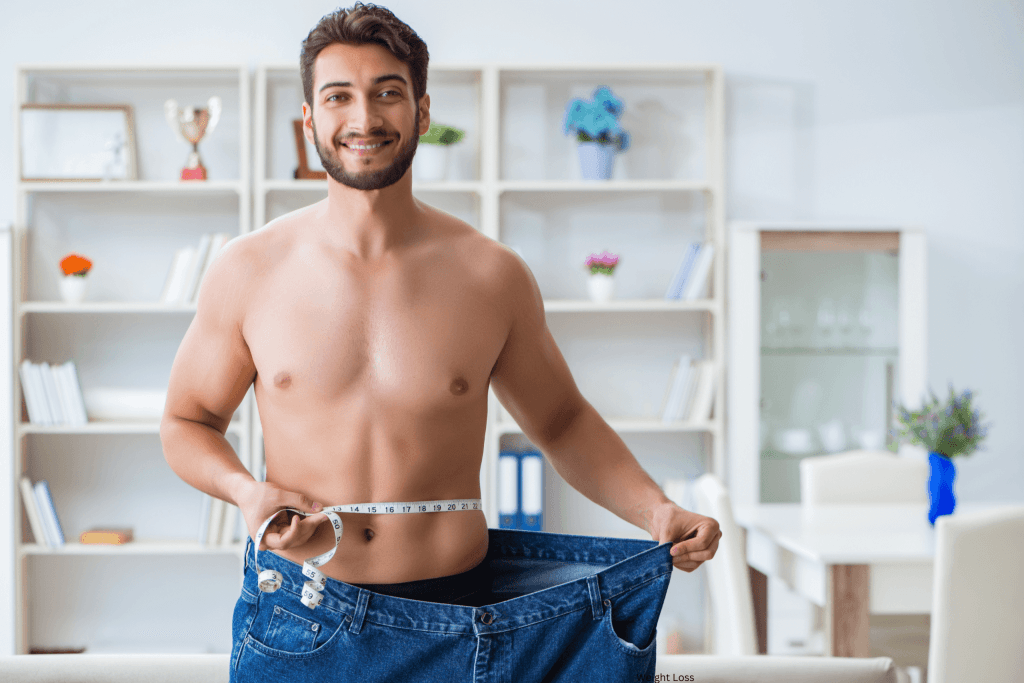 young aged man smiling CUZ he lost weight