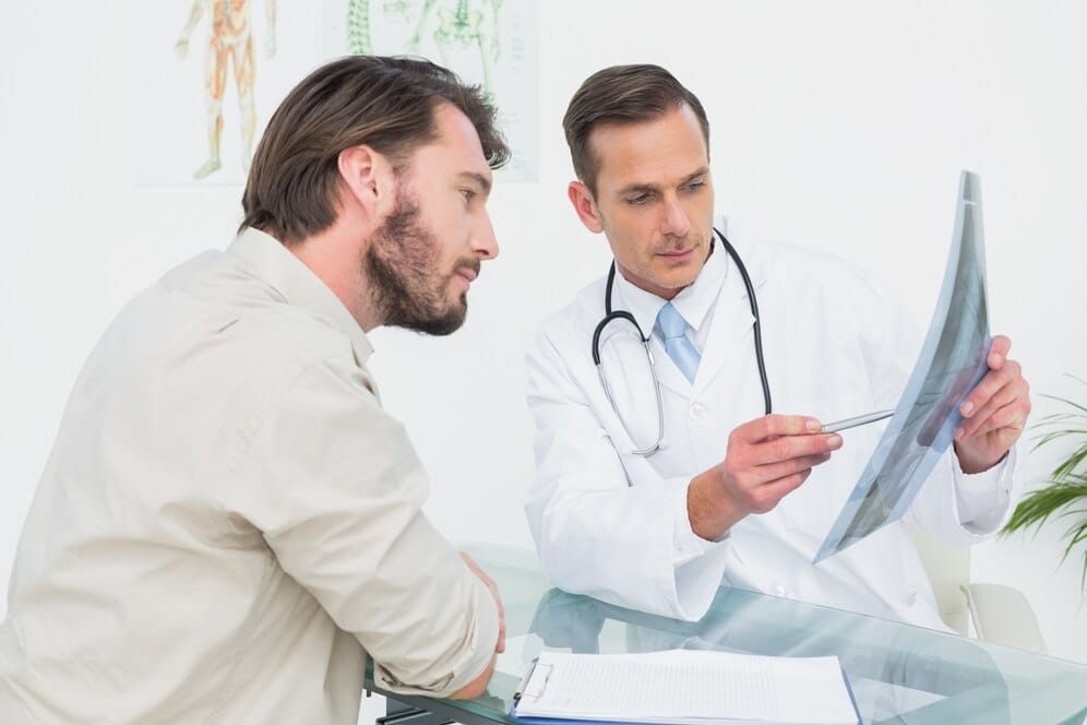 Male doctor explaining